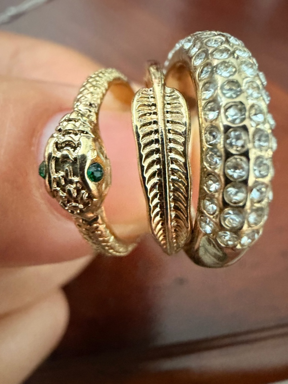 Set of 3 Gold Tone Stacking Rings – Snake, Feather & Pavé Crystal